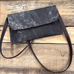 Jackson Hyde
Elegant Black and Brown Crossbody Clutch- Never Used